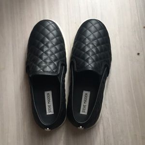 Black Steve Madden slip ons